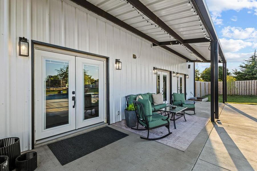 Entrance to property with french doors and a patio area Entrance to property with french doors and a patio area