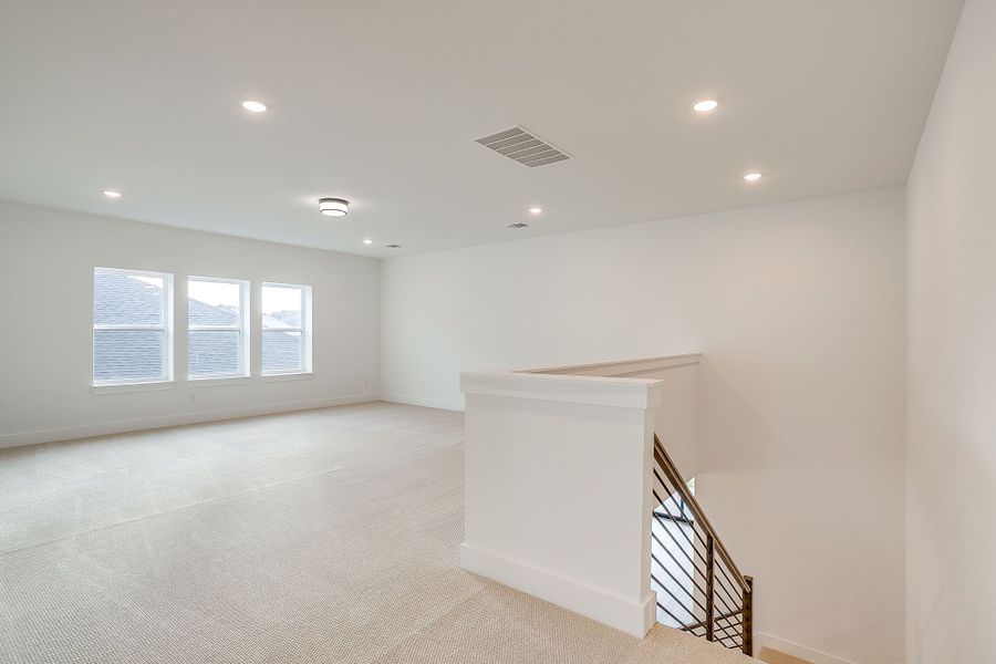 Representative unfurnished interior of a home built from the Valera by Graham Hart Home Builder in Bear Ridge, Burleson (Image 21).