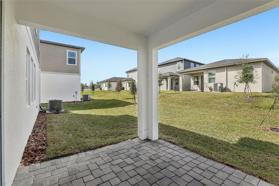 Exterior details and patio area of a home in Cyrene at Minneola, Minneola (Image 26).