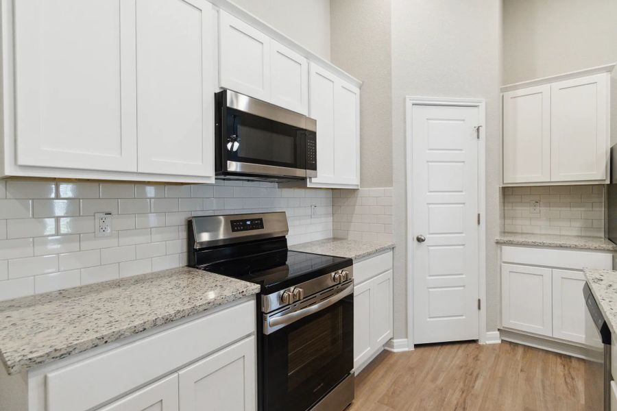 Representative furnished interior of a home built from the Duplex 1299 by TwoTen Communities in Amanda Park, San Antonio (Image 12). Representative furnished interior of a home built from the Duplex 1299 by TwoTen Communities in Amanda Park, San Antonio (Image 12).