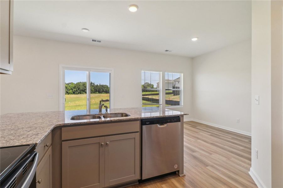 This kitchen offers an open layout, ideal for casu This kitchen offers an open layout, ideal for casu