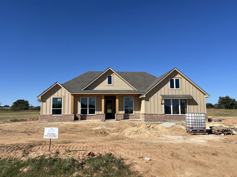 Front exterior of a new home in Zion Valley, Poolville, TX, highlighting curb appeal (Image 1). Front exterior of a new home in Zion Valley, Poolville, TX, highlighting curb appeal (Image 1).