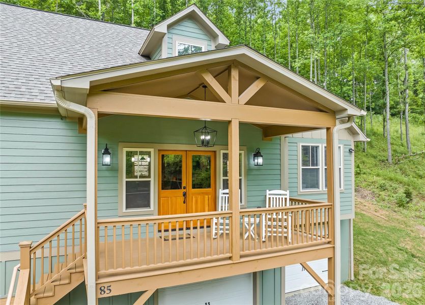 Exterior details and patio area of a home in , Waynesville (Image 25).