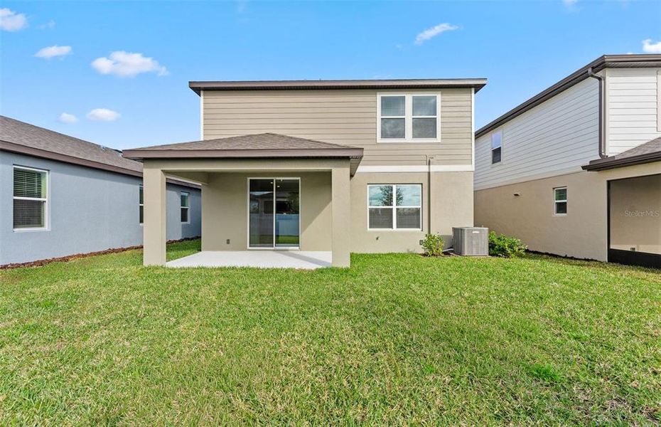 Exterior details and patio area of a home in Pioneer Ranch, Ocala (Image 3).