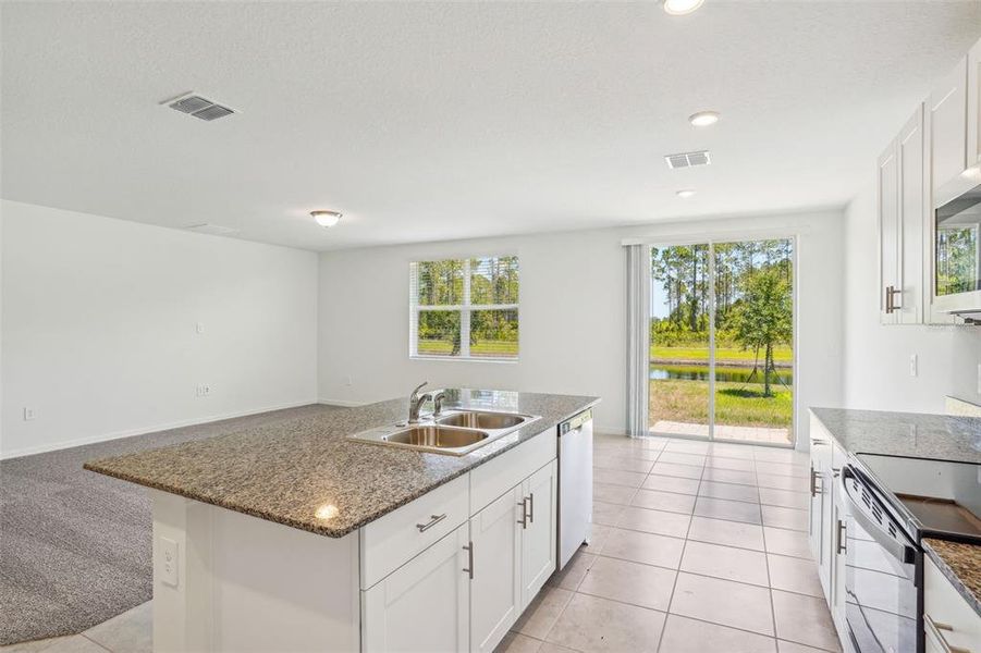 Furnished interior view inside a new home in Lake Deer Estates - Signature Series, Poinciana (Image 13). Furnished interior view inside a new home in Lake Deer Estates - Signature Series, Poinciana (Image 13).