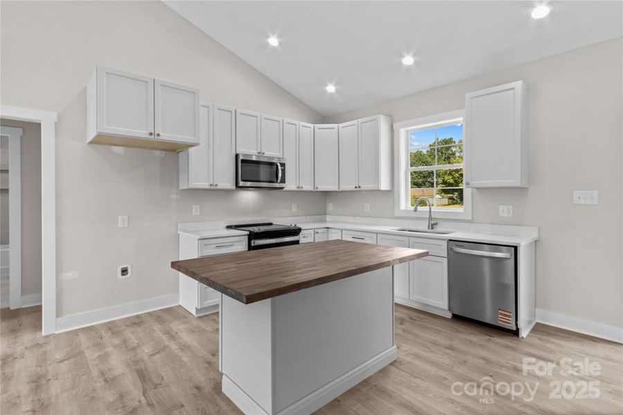 Furnished interior view inside a new home in , Statesville (Image 6).