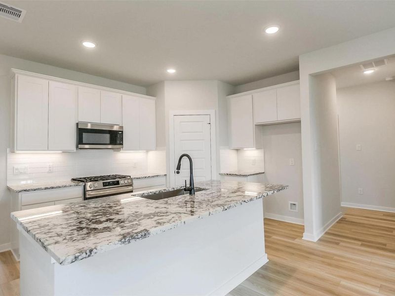 Furnished interior view inside a new home in Emberly, Beasley (Image 7).