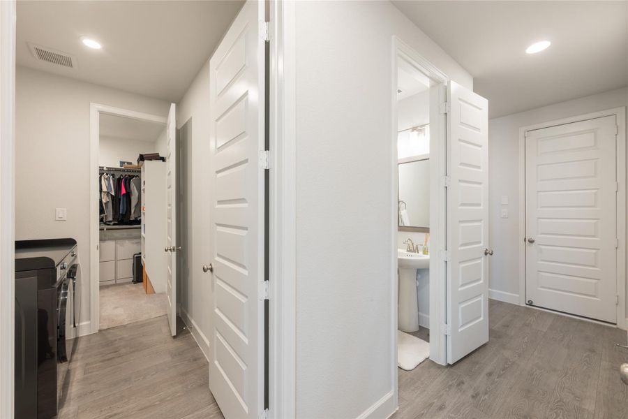 Furnished interior view inside a new home in Elyson, Katy (Image 19).