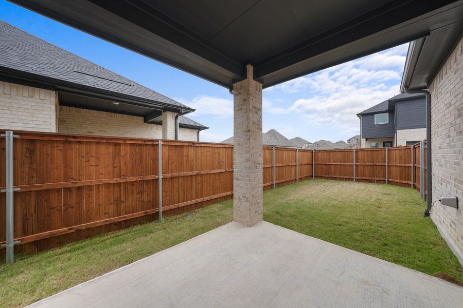 Exterior details and patio area of a home in Cottages of Celina, Celina (Image 4).