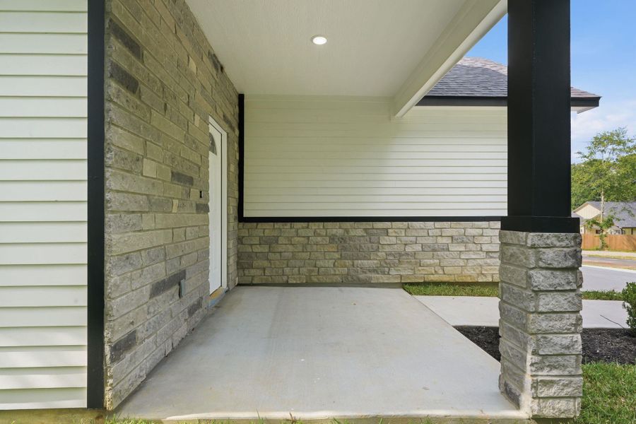 Exterior details and patio area of a home in , Willis (Image 3).