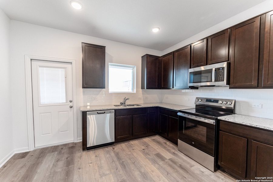 Furnished interior view inside a new home in Katzer Ranch, Converse (Image 5).