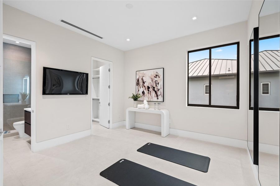 Upstairs bedroom with ensuite bathroom and walk in closet. Upstairs bedroom with ensuite bathroom and walk in closet.