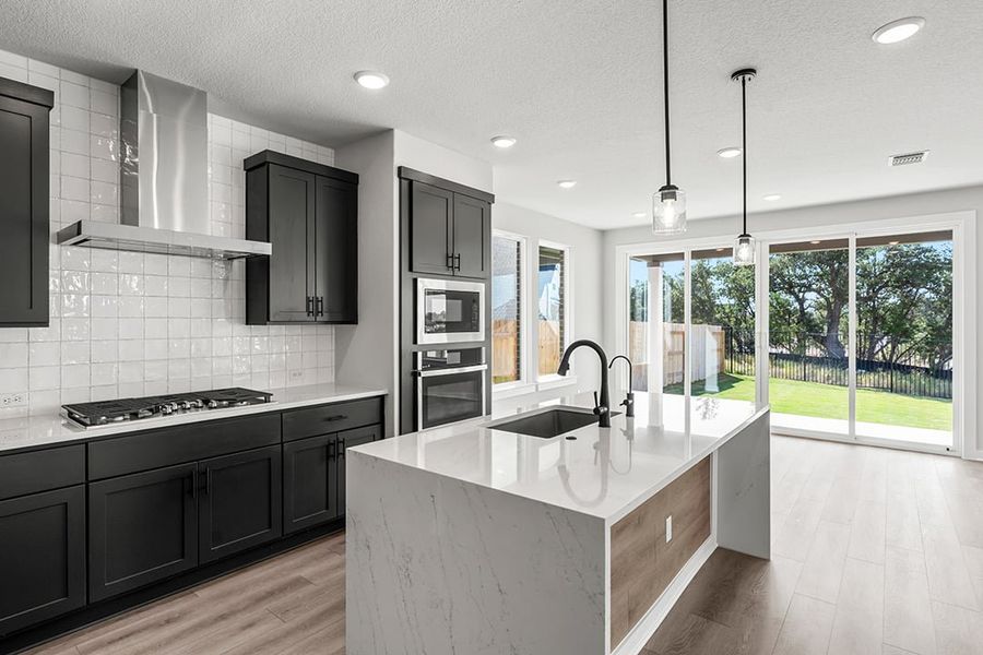 Furnished interior view inside a new home in Terrace Collection at Lariat, Liberty Hill (Image 13). Furnished interior view inside a new home in Terrace Collection at Lariat, Liberty Hill (Image 13).