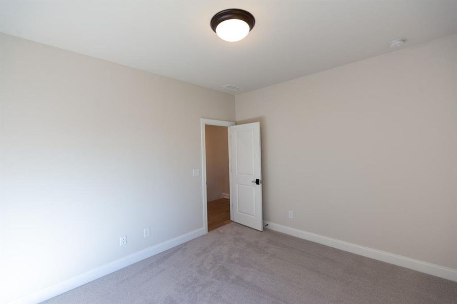 Spacious, unfurnished interior of a new home in Bellmoore Park, Johns Creek (Image 28).