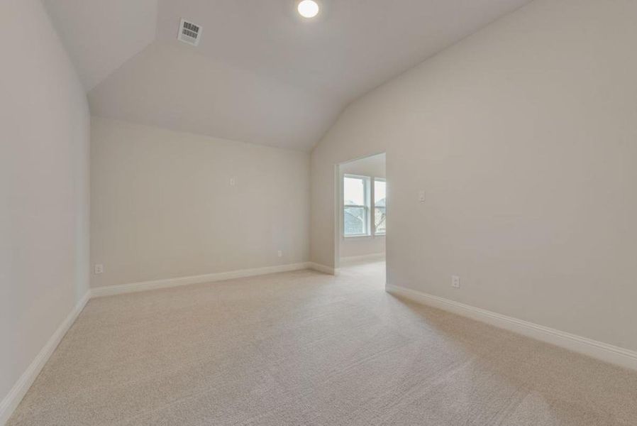 Representative unfurnished interior of a home built from the Brandonwood by Grand Homes in Edgewater, Fate (Image 27).
