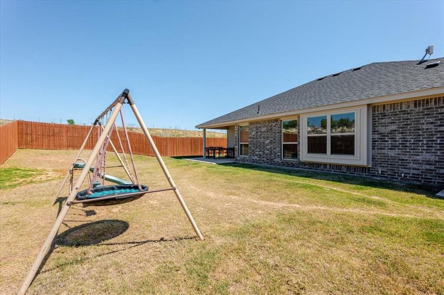 Exterior details and patio area of a home in , Glen Rose (Image 3).