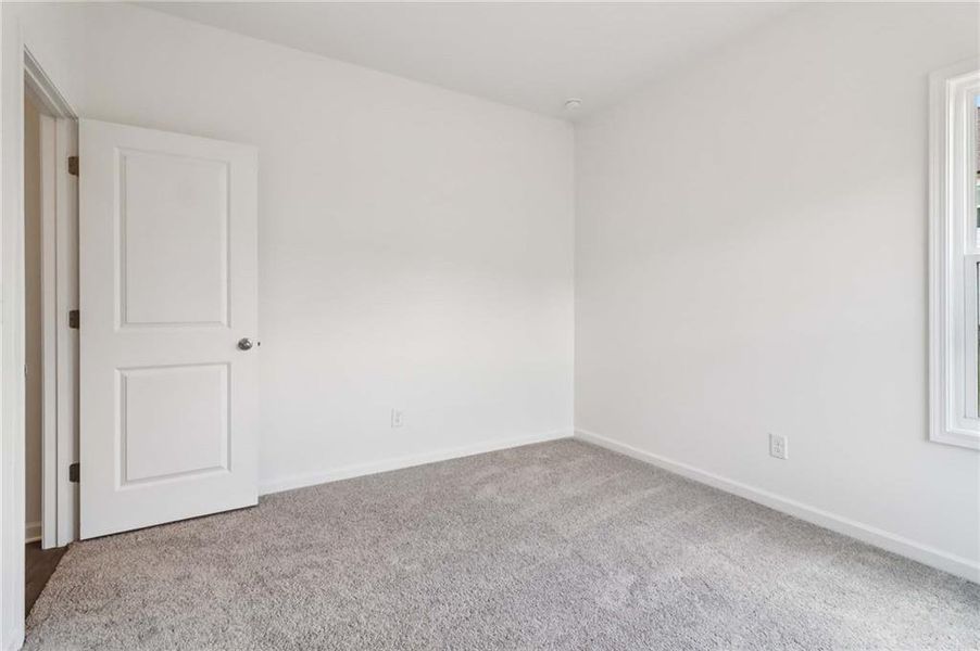 Spacious, unfurnished interior of a new home in Eastlyn Crossing, Flowery Branch (Image 13). Spacious, unfurnished interior of a new home in Eastlyn Crossing, Flowery Branch (Image 13).