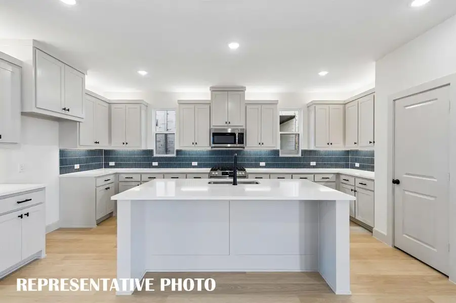 This wonderful kitchen island is the hub of your new chefs kitchen and the perfect place for friends and family to gather round.  REPRESENTATIVE PHOTO