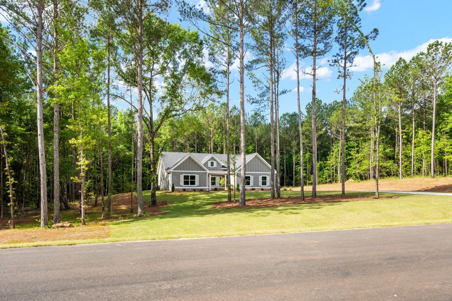 Front exterior of a new home in Flint Farms, Concord, GA, highlighting curb appeal (Image 19).