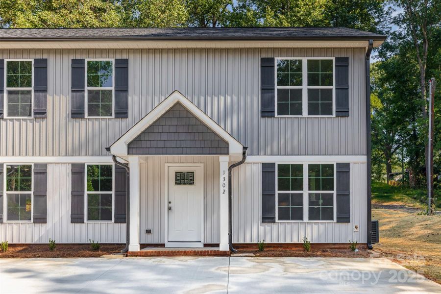 Front exterior of a new home in , Kannapolis, NC, highlighting curb appeal (Image 17).