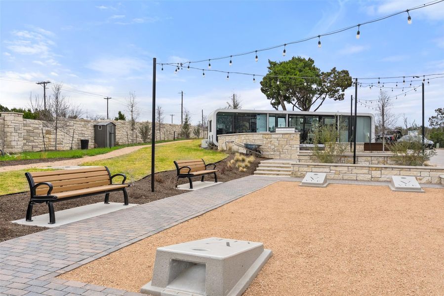 Surrounding community with a patio area