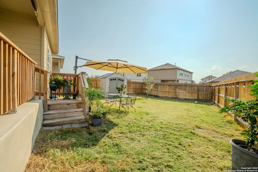 Exterior details and patio area of a home in The Links at River Bend, Floresville (Image 22).