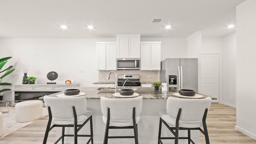 Representative furnished interior of a home built from the 1293 by D.R. Horton in Bridges on Lake Houston Villas, Humble (Image 17).