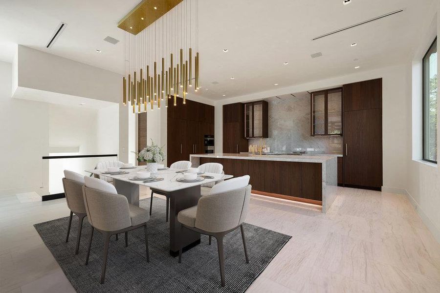 Dining room featuring baseboards and recessed lighting