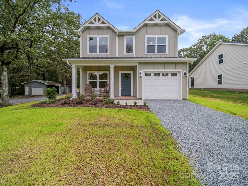 Front exterior of a new home in , Marshville, NC, highlighting curb appeal (Image 21). Front exterior of a new home in , Marshville, NC, highlighting curb appeal (Image 21).