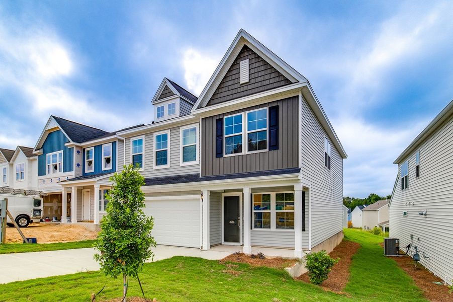 Front exterior of a new home in Bluefield, Lexington, SC, highlighting curb appeal (Image 2). Front exterior of a new home in Bluefield, Lexington, SC, highlighting curb appeal (Image 2).