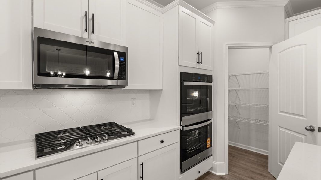 Representative furnished interior of a home built from the Grayson by D.R. Horton in Holland Estates, Powder Springs (Image 7).