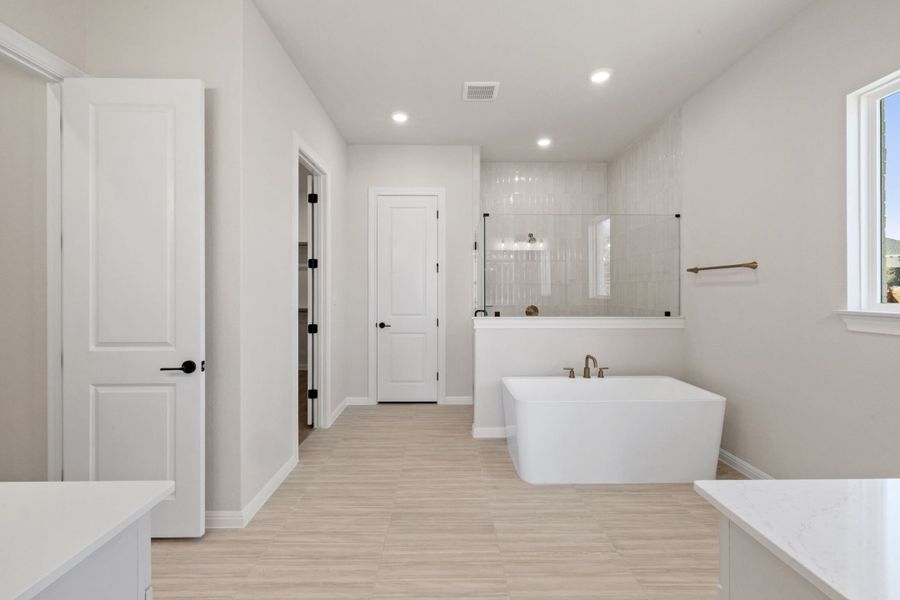 Representative furnished interior of a home built from the Ashlyn by Ashton Woods in Provence, Austin (Image 14).