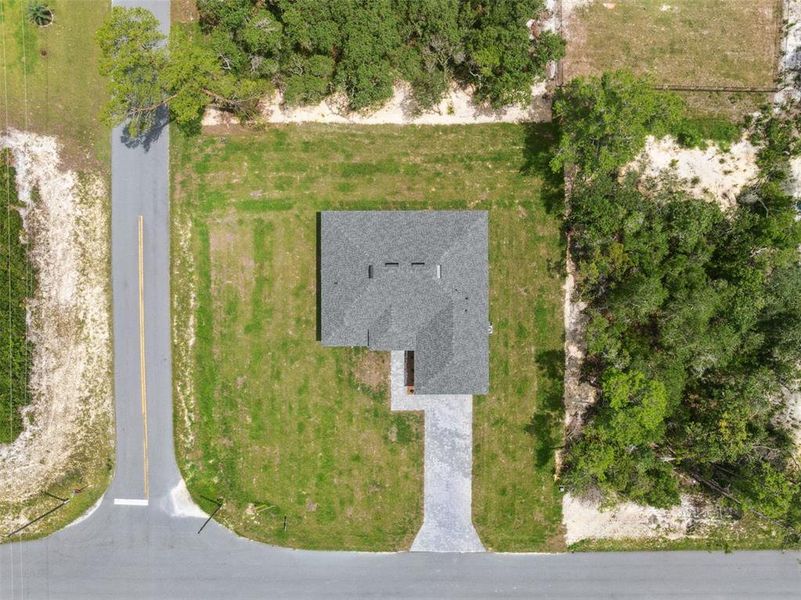 Front exterior of a new home in , Ocala, FL, highlighting curb appeal (Image 25).
