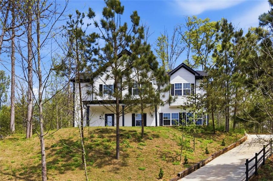 Front exterior of a new home in , Gainesville, GA, highlighting curb appeal (Image 20).
