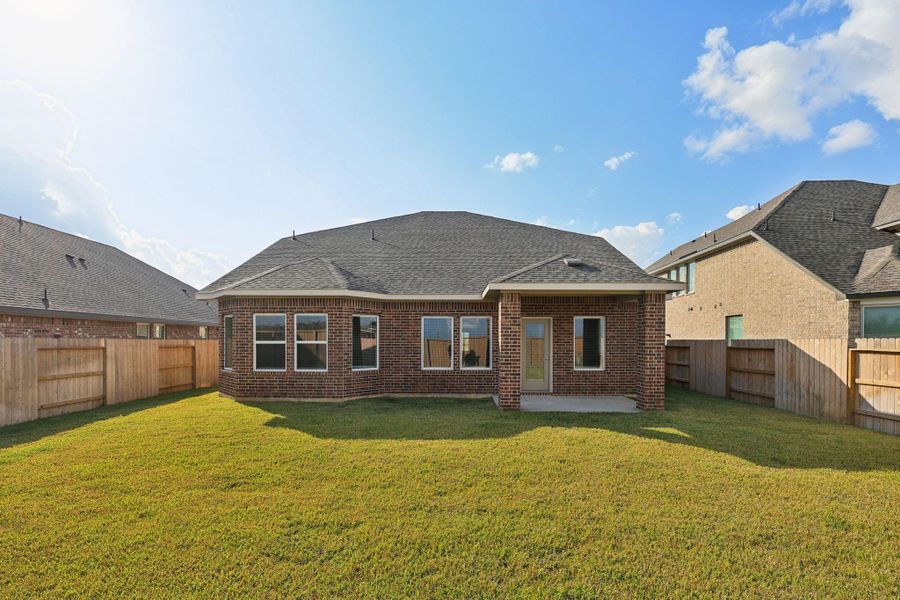 Exterior details and patio area of a home in Massey Oaks - Premier Series, Pearland (Image 18). Exterior details and patio area of a home in Massey Oaks - Premier Series, Pearland (Image 18).