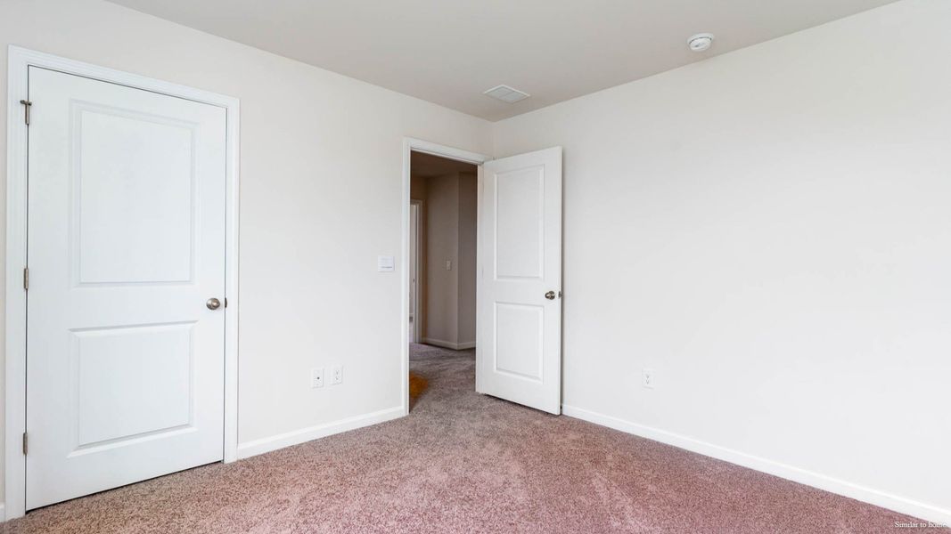 Spacious, unfurnished interior of a new home in Indigo Preserve, Leland (Image 21).