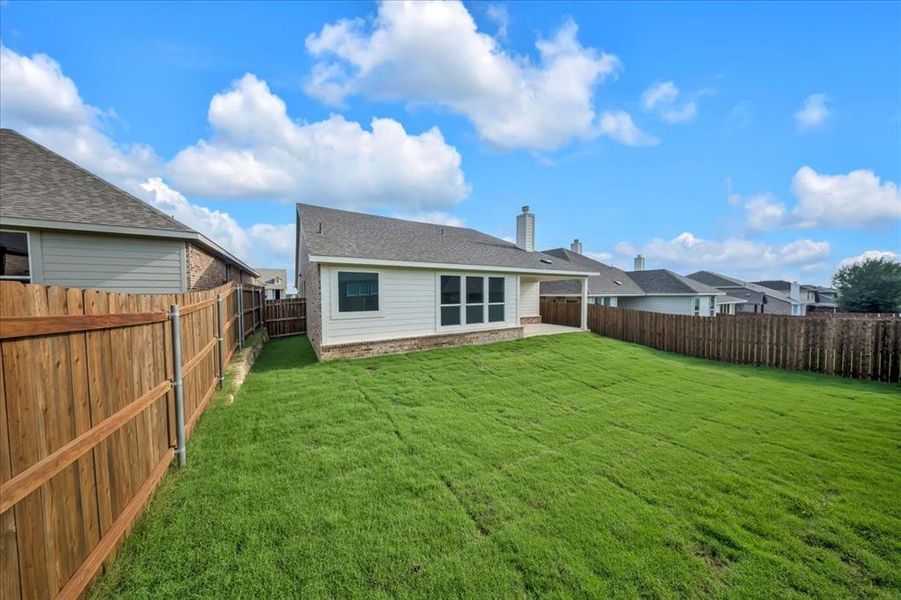 Front exterior of a new home in Liberty Pointe, Gainesville, TX, highlighting curb appeal (Image 22).