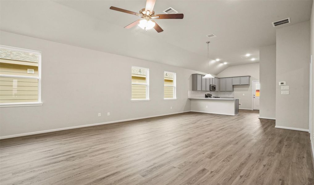 Open living area (*Photo not of actual home and used for illustration purposes only.)