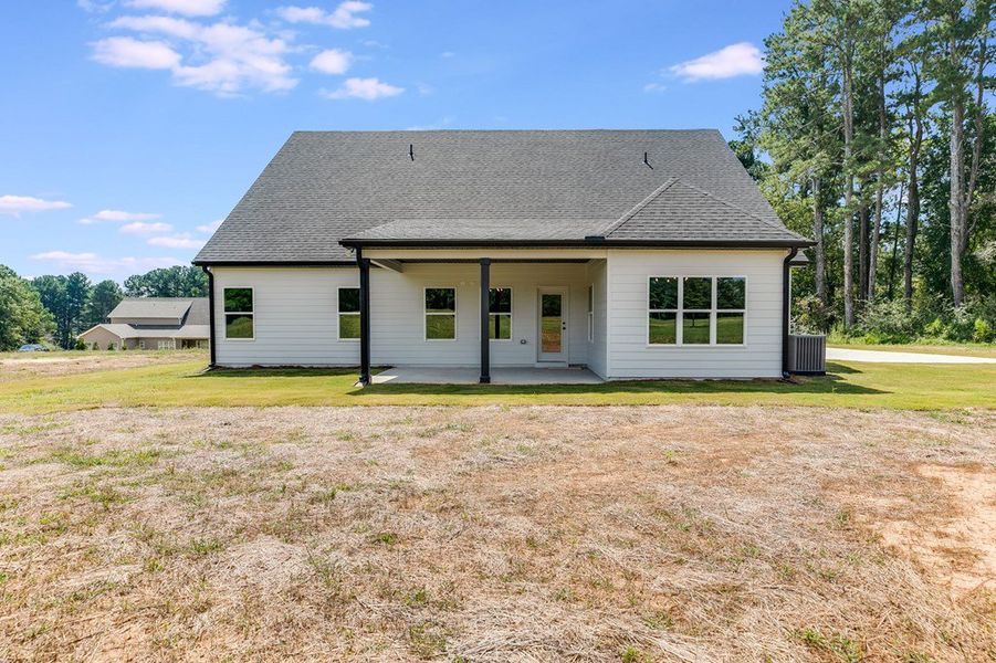 Front exterior of a new home in LOVVORN ESTATES, Carrollton, GA, highlighting curb appeal (Image 27).