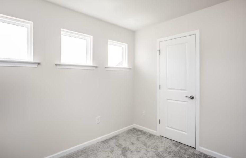 Spacious, unfurnished interior of a new home in Saunders Farm, Willow Spring (Image 12). Spacious, unfurnished interior of a new home in Saunders Farm, Willow Spring (Image 12).