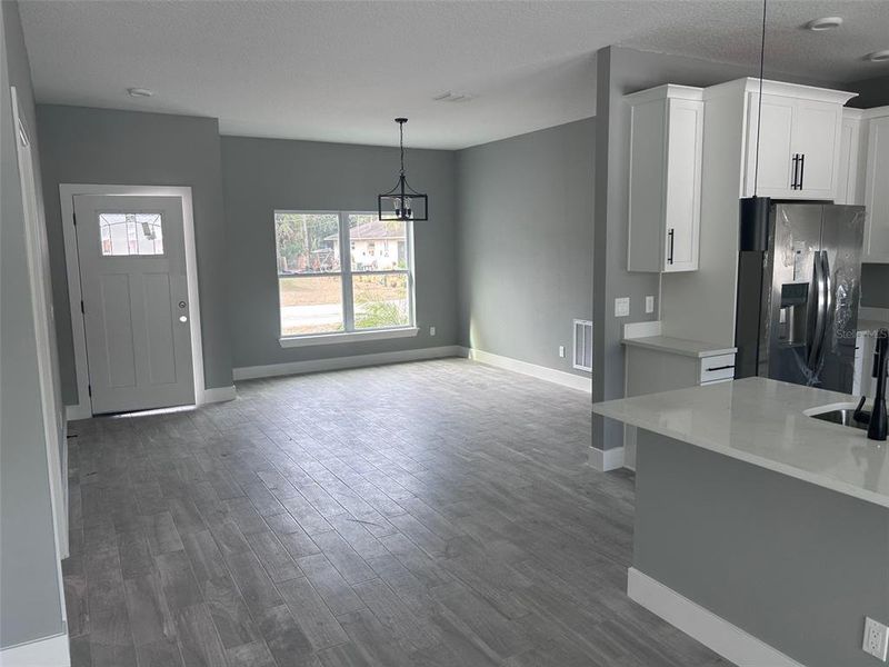 Spacious, unfurnished interior of a new home in , New Smyrna Beach (Image 15).