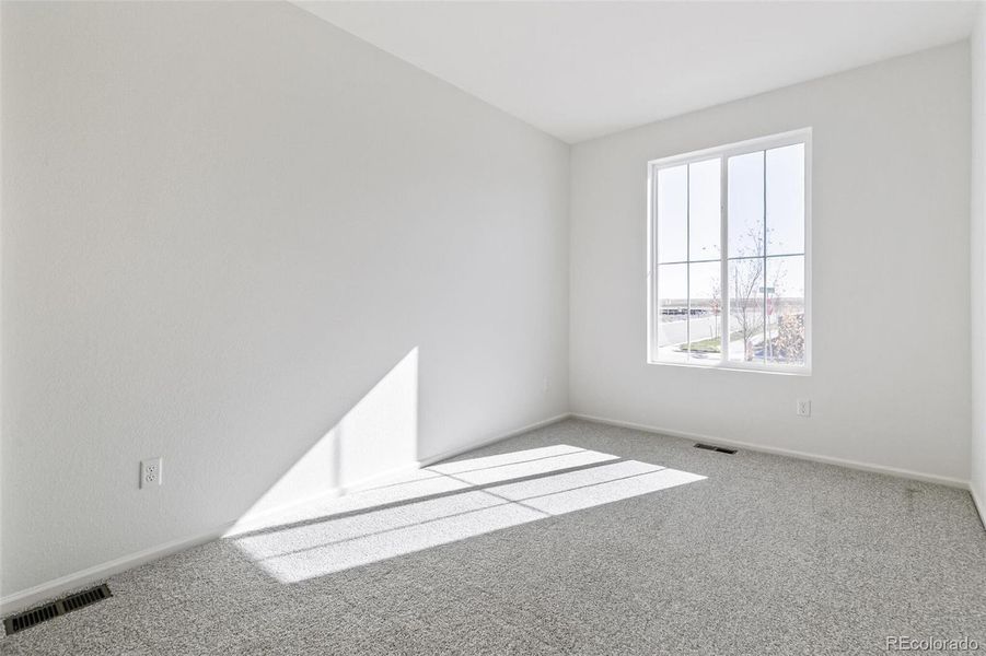 Spacious, unfurnished interior of a new home in Legato, Commerce City (Image 22).