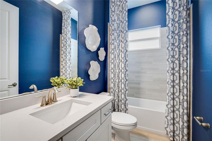 Furnished interior view inside a new home in Calusa Country Club, Lakewood Ranch (Image 21).