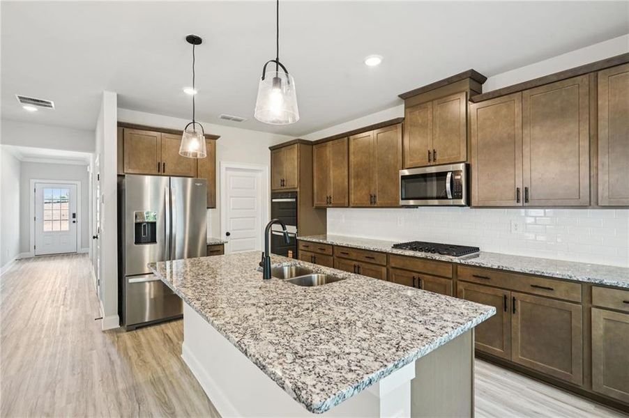 Furnished interior view inside a new home in Martin Springs - Estate Series, Lawrenceville (Image 15).
