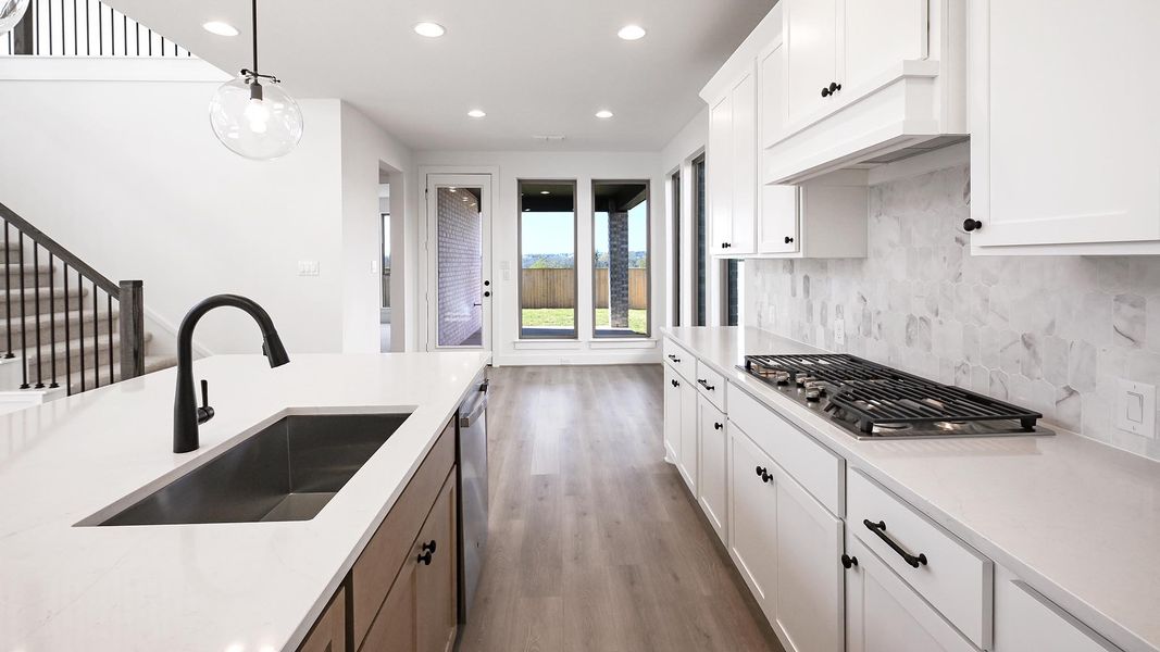 Furnished interior view inside a new home in Crosswinds 50', Kyle (Image 6).