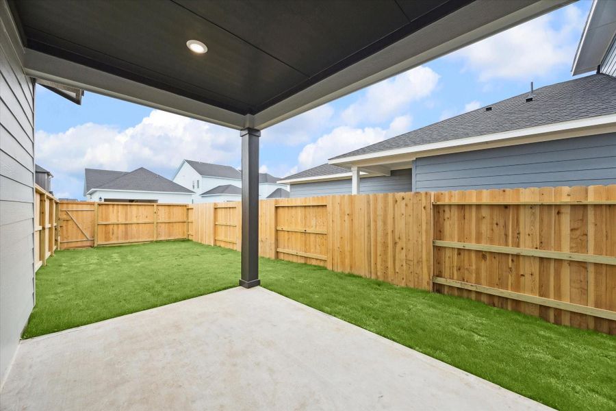 Exterior details and patio area of a home in Elyson, Katy (Image 4).