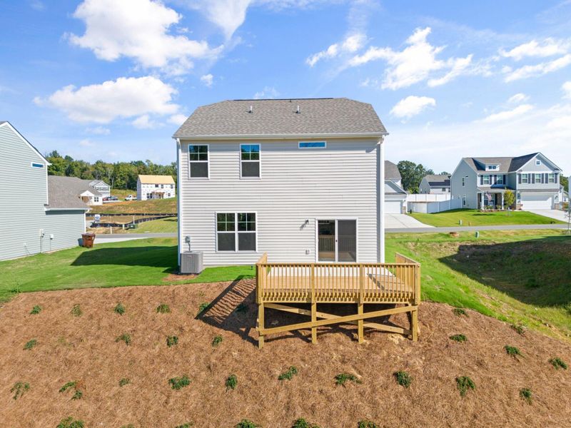 Front exterior of a new home in Cottages at Piper Village, Trinity, NC, highlighting curb appeal (Image 21).
