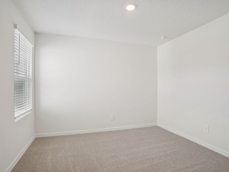 Spacious, unfurnished interior of a new home in The Meadow at Crossprairie Townes, St. Cloud (Image 13).