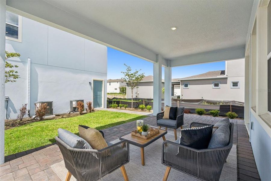 Exterior details and patio area of a home in Laureate Park, Orlando (Image 38).