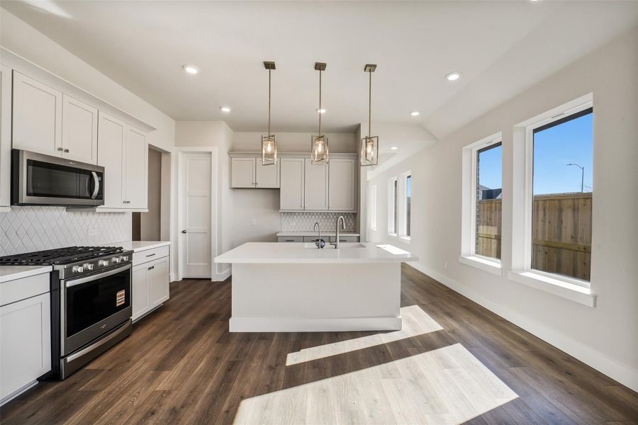 Furnished interior view inside a new home in Sunterra, Katy (Image 5).